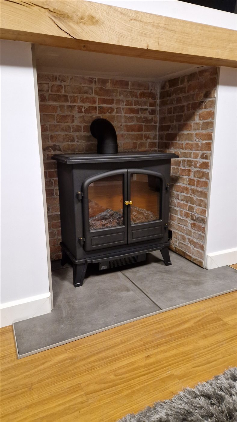 Brick-effect tiled fireplace surround